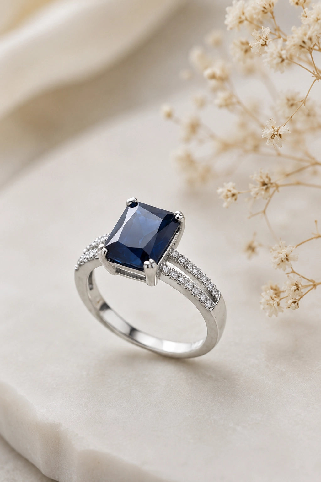 Blue Emerald-Cut Halo Ring